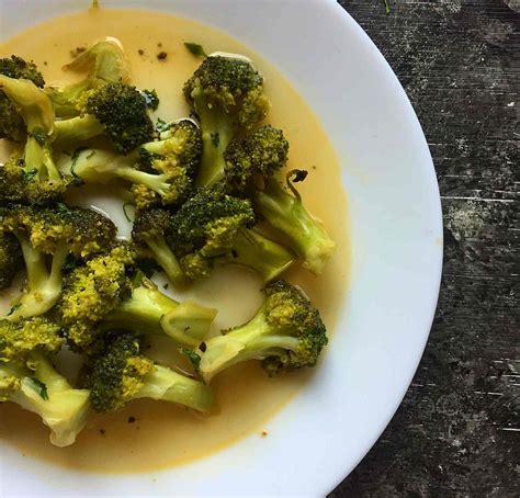 broccoli-with-lemon-butter-sauce-recipe-archanas image