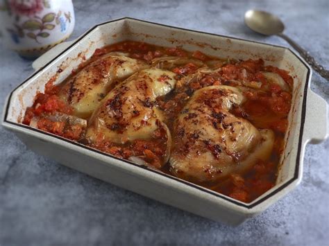 baked-chicken-legs-with-tomato-and-oregano image