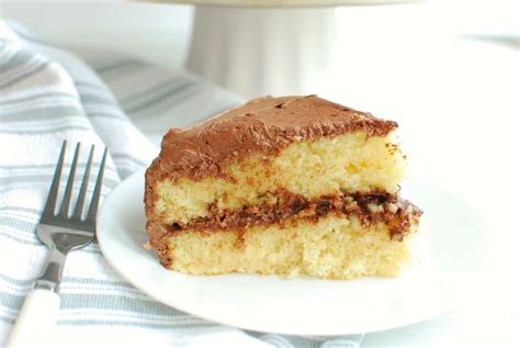 dairy-free-yellow-cake-with-chocolate-frosting image
