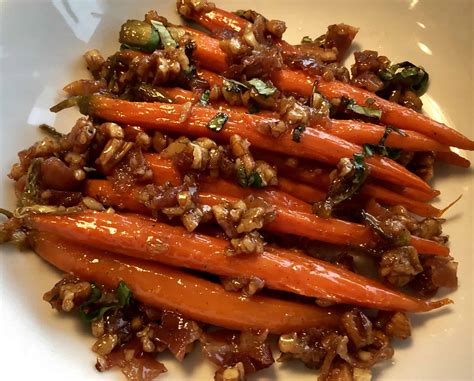 maple-glazed-carrots-with-prosciutto-pecans image