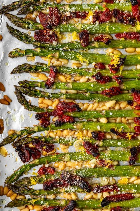 oven-roasted-asparagus-with-sun-dried-tomatoes image
