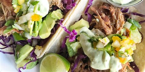 best-pulled-pork-tacos-with-avocado-crema-recipe-delish image