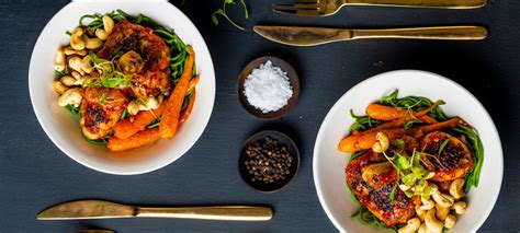 sticky-citrus-chicken-roasted-with-cashews-and-carrots image
