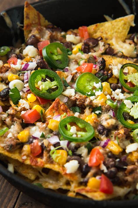 fully-loaded-nachos-with-chorizo-black-beans-and-corn image