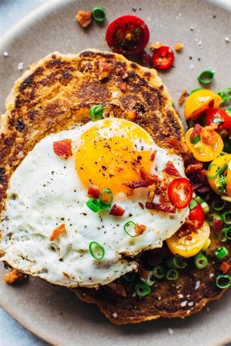 savory-breakfast-pancakes-with-bacon-and-fried-eggs image