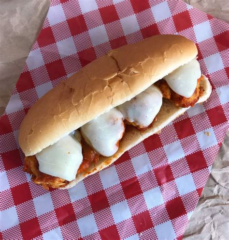 chicken-parmesan-meatball-sub-sandwiches-meal image