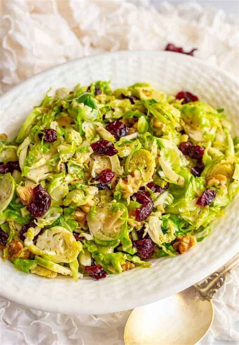 shredded-brussels-sprouts-with-cranberries-and-walnuts image