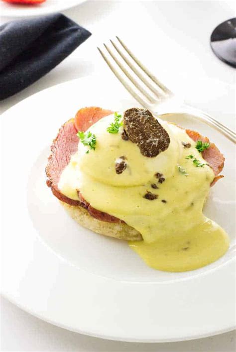 eggs-benedict-with-white-truffle-hollandaise-sauce image