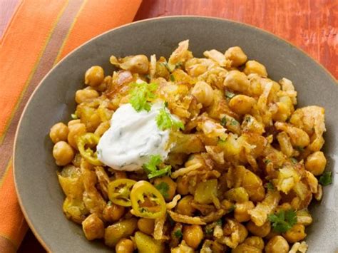 curried-potatoes-and-chickpeas-recipe-food-network image