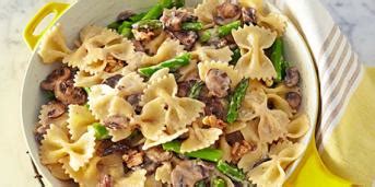 creamy-farfalle-with-cremini-asparagus-and-walnuts image