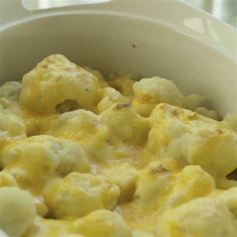 baked-cauliflower-with-cheddar-cheese-sauce-copykat image