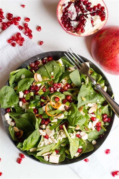 spinach-and-pomegranate-salad-with-clementine image