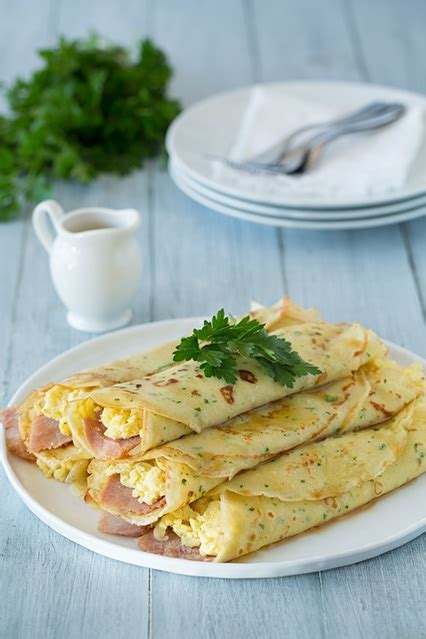 herb-crepes-with-eggs-swiss-ham-and-browned-butter image