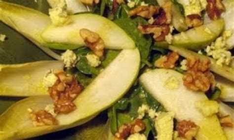 salad-with-arugula-endive-walnuts-pears-blue-cheese image