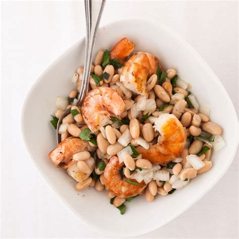 shrimp-with-cannellini-bean-salad-recipe-food-wine image