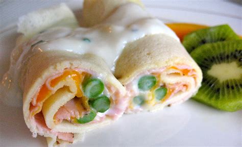 ham-and-asparagus-crepes-with-bechamel-sauce image