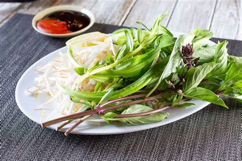 what-are-the-herbs-in-vietnamese-pho-garnish-plates image