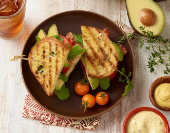 bacon-arugula-california-avocado-and-tomato-sandwiches image