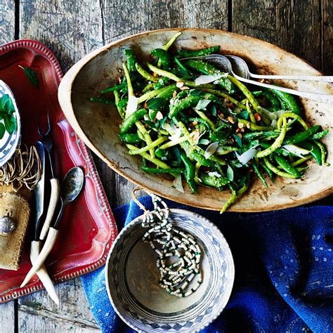 snap-peas-and-green-beans-with-arugula-mint-pesto image