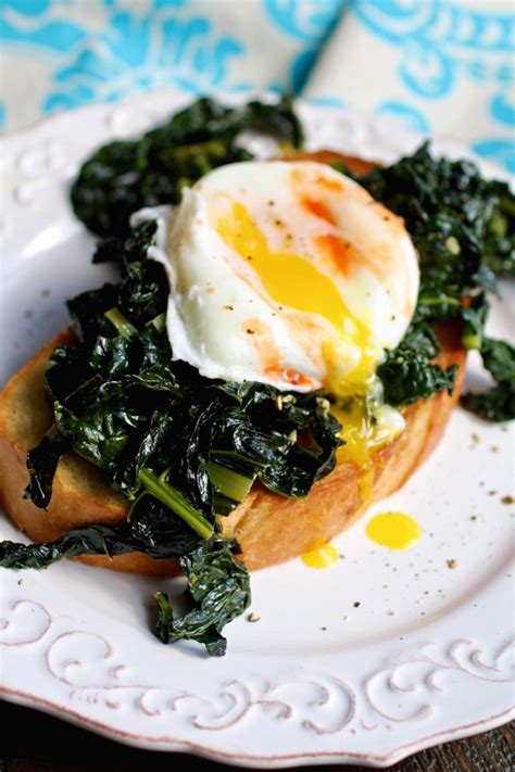 sauted-kale-on-toast-with-poached-eggs-grab-a-plate image