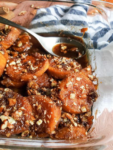 bourbon-spiked-candied-yams-with-crushed-pecan image