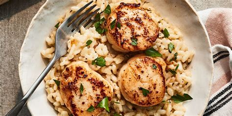 scallop-risotto-with-brown-butter-parmesan-eatingwell image