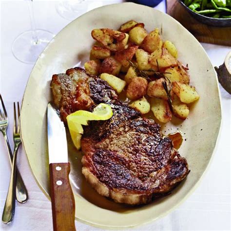 grilled-rib-eye-steaks-with-roasted-rosemary-potatoes image