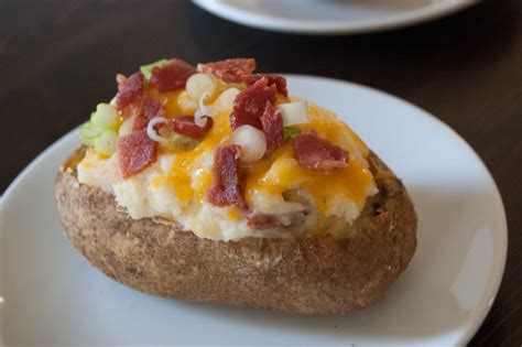 loaded-baked-potatoes-dishing-up-dinner image