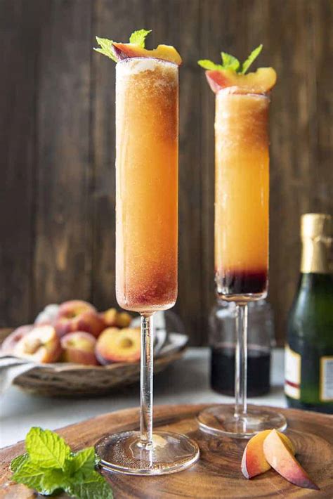 the-best-frozen-peach-bellini-the-crumby-kitchen image