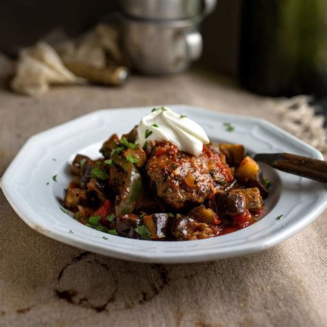 turkish-beef-patties-with-eggplant-pepper-tomato image