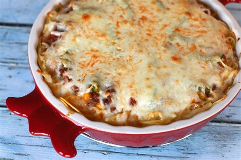 spaghetti-pie-with-ground-beef-and-cheese-recipe-the-spruce image
