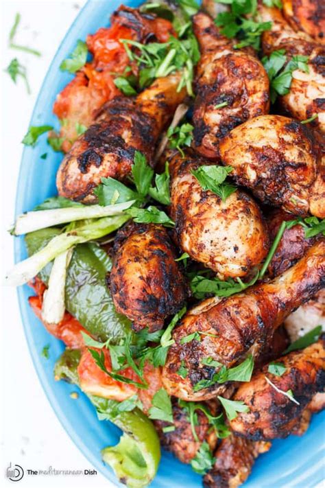 grilled-chicken-legs-with-garlic-harissa-marinade image