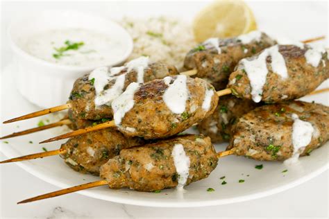chicken-kofta-kebabs-with-garlicky-yogurt-sauce-and-a image