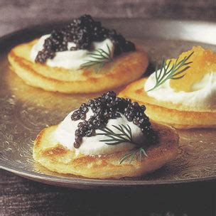 blini-with-caviar-and-creme-fraiche-the-food-channel image