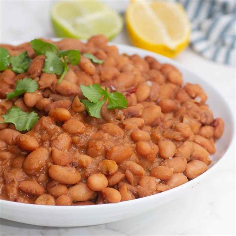 chipotle-pinto-beans-copycat-recipe-the-daily-dish image