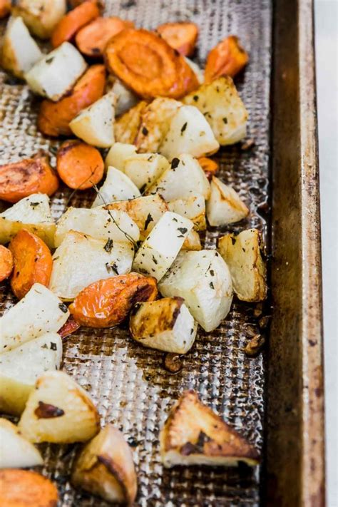 herb-roasted-turnips-and-carrots-fork-in-the-road image