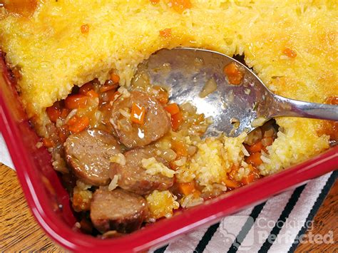 sausage-casserole-with-a-cheesy-rice-topping image