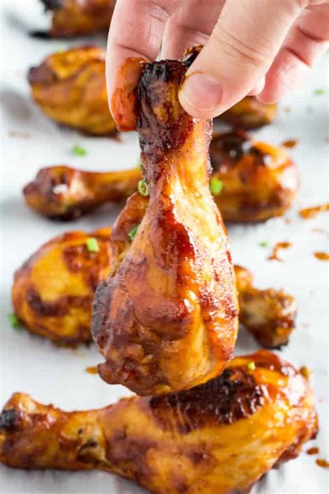 baked-bbq-chicken-drumsticks-recipe-dishing-delish image
