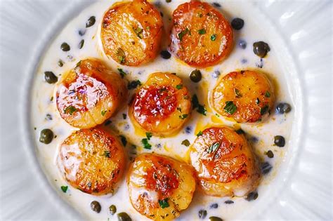 seared-scallops-with-creamy-lemon-caper-sauce-julias image
