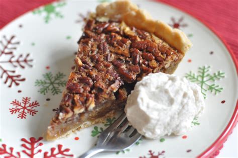 bourbon-pecan-pie-with-cinnamon-whipped-cream image