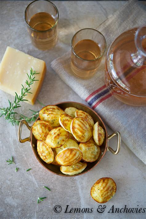savory-parmesan-herb-madeleines-lemons image