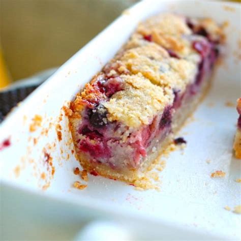 triple-berry-pie-bars-recipe-pinch-of-yum image