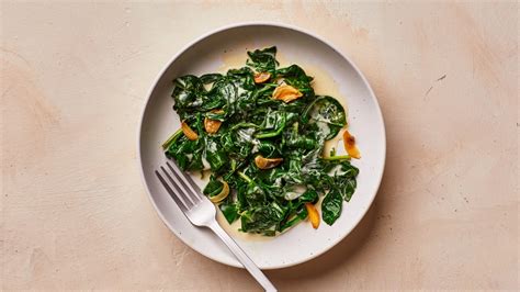 spinach-with-garlic-and-crme-frache-recipe-bon-apptit image