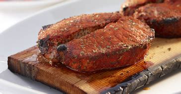 cedar-planked-pork-steaks-recipe-ontario-pork image