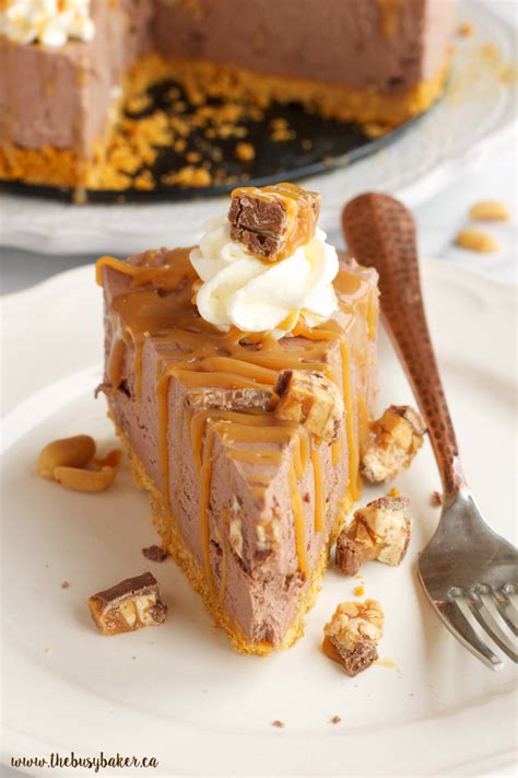 easy-no-bake-snickers-cheesecake-the-busy-baker image