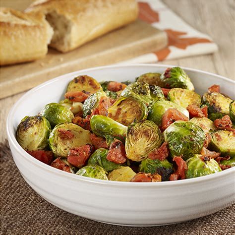 oven-roasted-brussels-sprouts-with-tomatoes-ready image