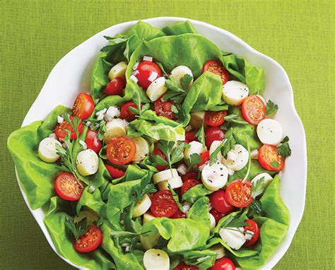 house-home-hearts-of-palm-and-cherry-tomato-salad image