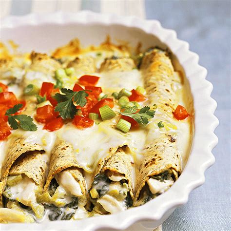 creamy-chicken-enchiladas-recipe-eatingwell image