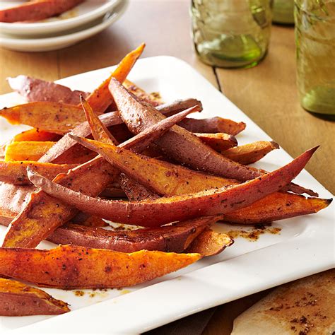 spiced-sweet-potato-wedges-recipe-eatingwell image