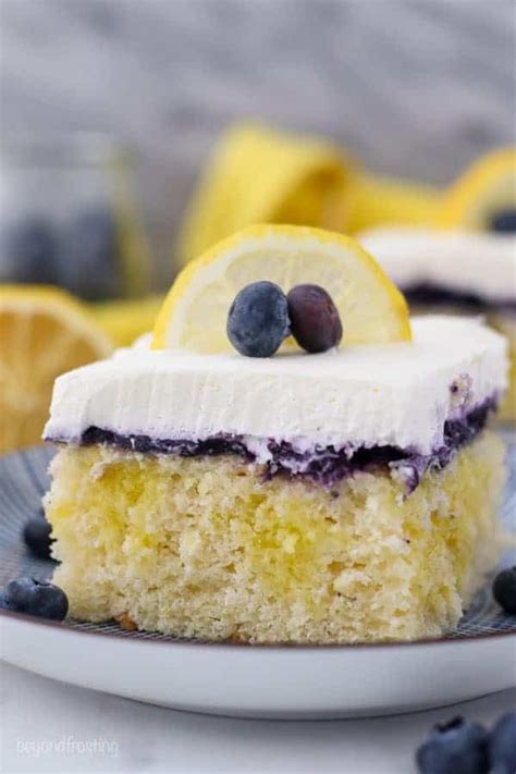 lemon-blueberry-poke-cake-recipe-beyond-frosting image